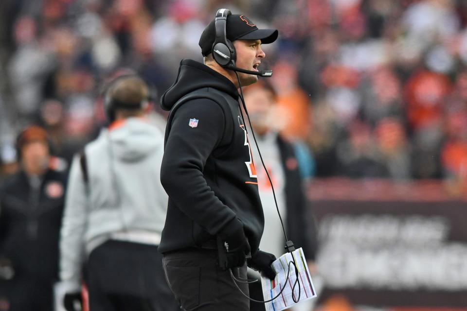 Cincinnati Bengals head coach Zac Taylor reacts to a penalty during the second half of an NFL football game against the Cleveland Browns, Sunday, Jan. 9, 2022, in Cleveland. (AP Photo/Nick Cammett)