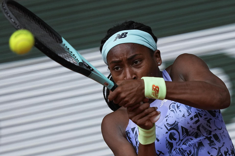 Coco Gauff of the U.S. plays a shot against Poland's Iga Swiatek during the final match at the French Open tennis tournament in Roland Garros stadium in Paris, France, Saturday, June 4, 2022. (AP Photo/Michel Euler)