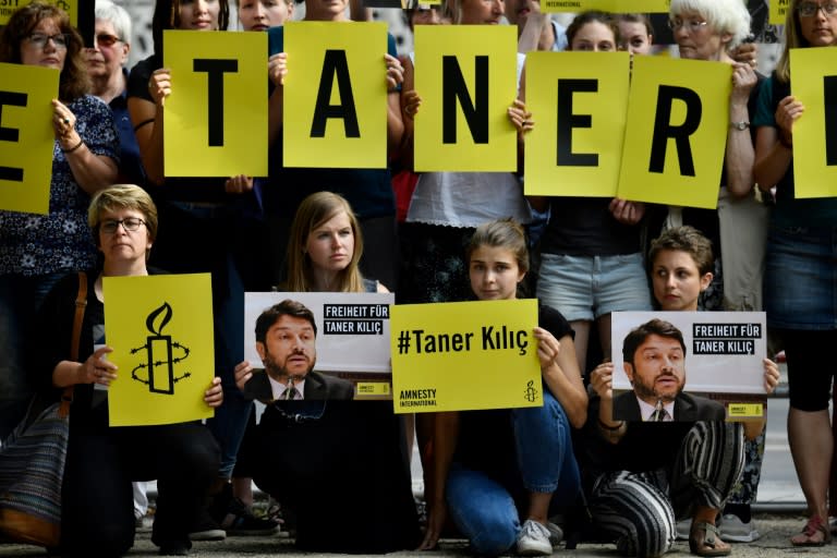 Activists have held protests against the detention of the head of Amnesty International in Turkey, Taner Kilic, in different countries, including in front of the Turkish Embassy in Berlin in July