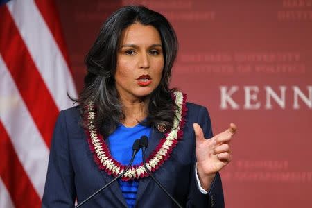 U.S. Representative Tulsi Gabbard (D-HI) speaks after being awarded a Frontier Award during a ceremony at the Kennedy School of Government at Harvard University in Cambridge, Massachusetts November 25, 2013. REUTERS/Brian Snyder