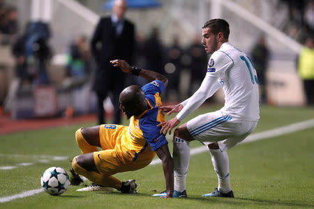 Soccer Football - Champions League - APOEL Nicosia vs Real Madrid - GSP Stadium, Nicosia, Cyprus - November 21, 2017 Apoel Nicosia’s Mickael Pote in action with Real Madrid’s Theo Hernandez REUTERS/Yiannis Kourtoglou