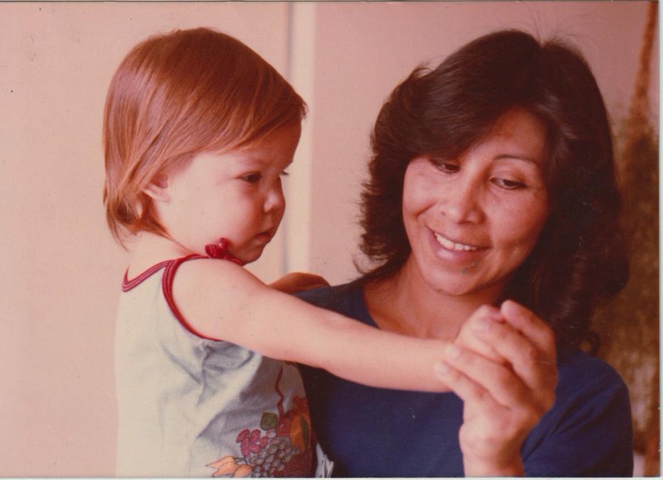 Kat Von D as a baby, held by her mother, Sylvia Galeano.