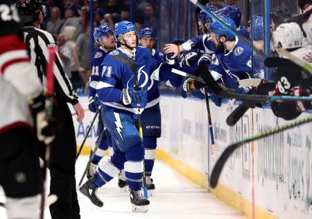 Mar 18, 2019; Tampa, FL, USA; Tampa Bay Lightning center Anthony Cirelli (71) is congratulated after scoring a goal against the Arizona Coyotes during the third period at Amalie Arena. Mandatory Credit: Kim Klement-USA TODAY Sports