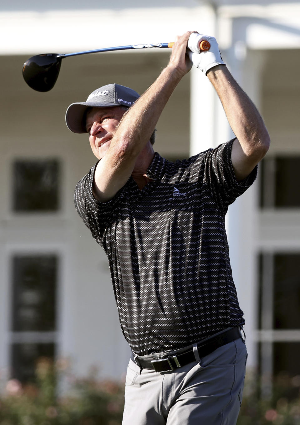 Wes Short, Jr. watches his drive in the first hole during the second round of Dominion Energy Charity Classic golf tournament at The Country Club of Virginia in Richmond, Va., Saturday, Oct. 17, 2020. (Daniel Sangjib Min/Richmond Times-Dispatch via AP)