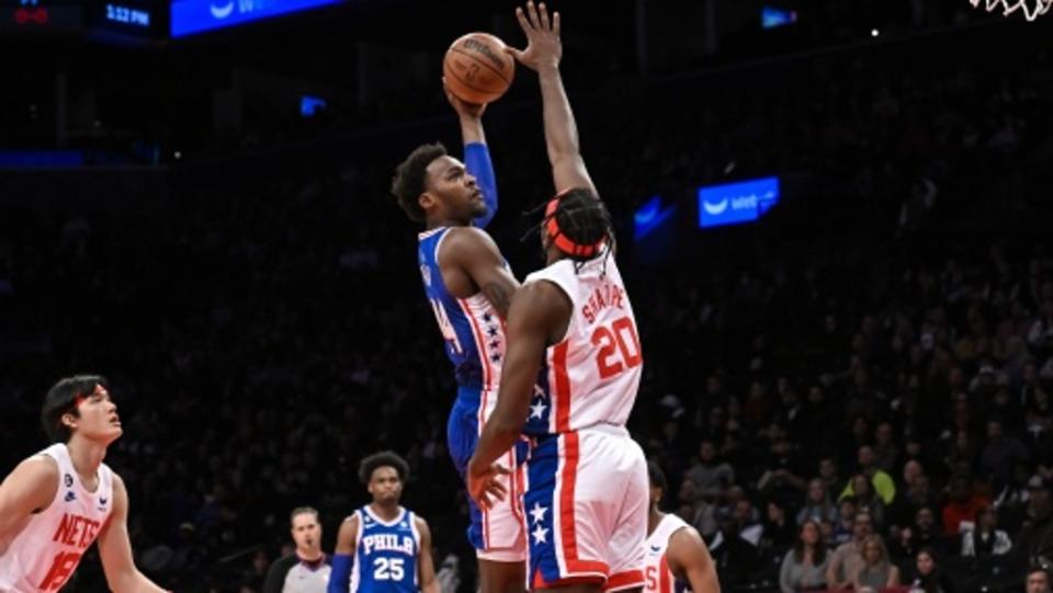 Philadelphia 76ers forward Paul Reed (44) shoots the ball against Brooklyn Nets center Day'Ron Sharpe (20) during the first quarter at Barclays Center