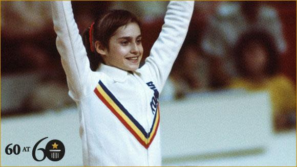 Given the nickname of 'Little Miss Perfect' due to her serious face and the ice-cold precision she adopted during her routines, the first award of a score of perfect 10 at an Olympics Games gymnastic event was to Nadia Comaneci (Romania) for her uneven bars routine in the team competition in Montreal, Canada, on 18 July 1976. Comaneci, who at the time was only 14 years old baffled audiences from around the world. Back in 1976, scoring a perfect 10 in gymnastics was thought of as impossible to achieve. So much so that Swiss company Omega who had responsibility for the timing and scoring of Olympic events since 1932, queried whether they would need room for three digits or four at the 1976 Montreal Olympic Games.