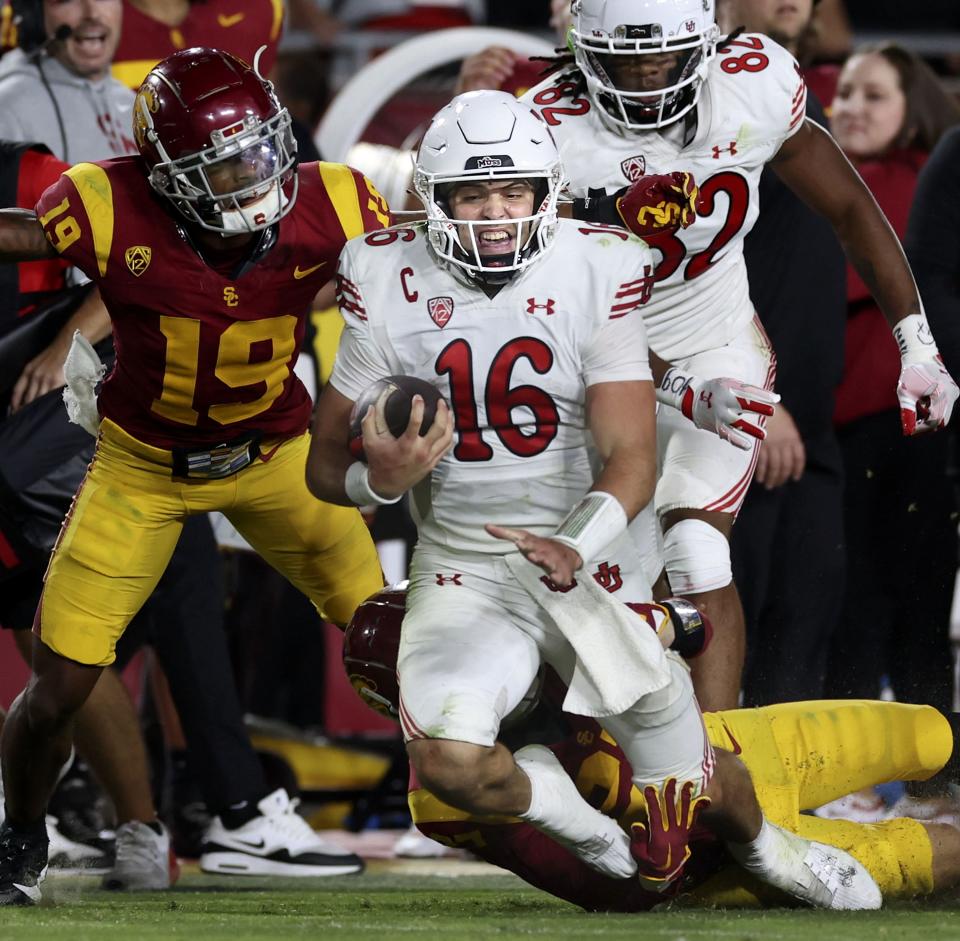 Utah Utes quarterback Bryson Barnes (16) scrambles to set up the winning field goal in the game against the USC Trojans at the Los Angeles Memorial Coliseum on Saturday, Oct. 21, 2023. | Laura Seitz, Deseret News