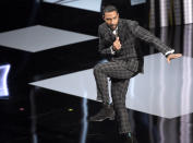 Omari Hardwick gestures as he appears on stage to accept the award for outstanding actor in a drama series for "Power" at the 50th annual NAACP Image Awards on Saturday, March 30, 2019, at the Dolby Theatre in Los Angeles. (Photo by Chris Pizzello/Invision/AP)