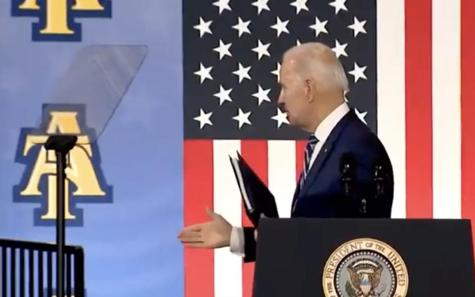 After Biden finished his speech, he turned around and tried to shake hands with thin air and then wandered around looking confused