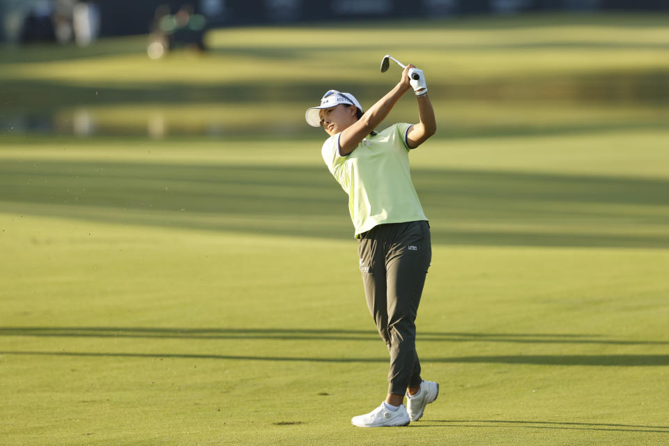 Jin Young Ko watches her shot form the first fairway during the first round of an LPGA golf tournament Thursday, Nov. 9, 2023, in Belleair, Fla. (AP Photo/Scott Audette)