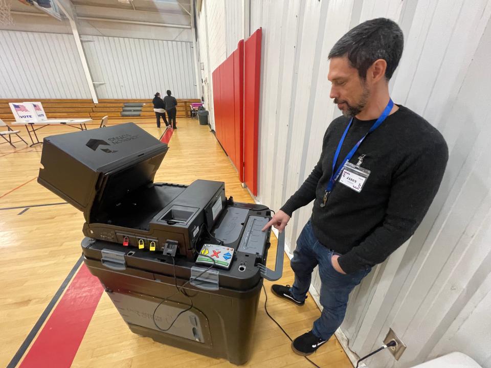 “It’s this area right here,” said poll volunteer Jason Hochstetler, pointing to the lockbox when the unscanned ballots were kept when the scanner was initially not working at the Gypsy Hill Gymnasium, Ward 3 in Staunton.