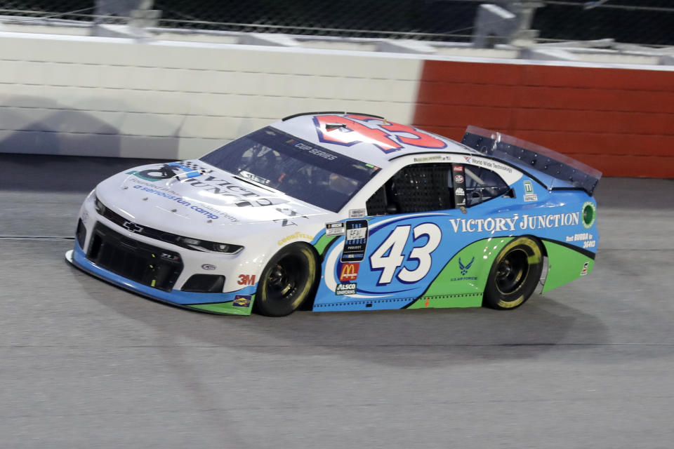 Bubba Wallace (43) drives during the NASCAR Cup Series auto race Wednesday, May 20, 2020, in Darlington, S.C. (AP Photo/Brynn Anderson)