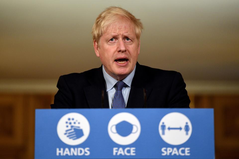 Britain's Prime Minister Boris Johnson speaks during a virtual press conference inside 10 Downing Street in central London on October 20, 2020. - British Prime Minister Boris Johnson said on Tuesday he will impose tougher coronavirus restrictions on the English city of Manchester, defying local leaders who oppose the move without greater financial help. Johnson said the city region of around 2.8 million residents would enter the highest risk category this weekend but, for the first time under a new system of localised curbs, would do so without the support its mayor and other leaders. (Photo by Leon Neal / POOL / AFP) (Photo by LEON NEAL/POOL/AFP via Getty Images)