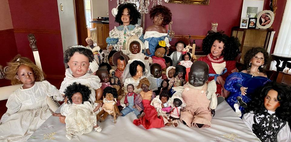 Some of Shawn R. Jones' collection of over 200 antique Black dolls.