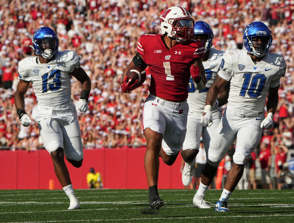 Sept. 2, 2023; Madison; Wisconsin Badgers running back Chez Mellusi (1) runs 89 yards for a touchdown against the Buffalo Bulls during the the third quarter at Camp Randall Stadium. Mark Hoffman-USA TODAY Sports