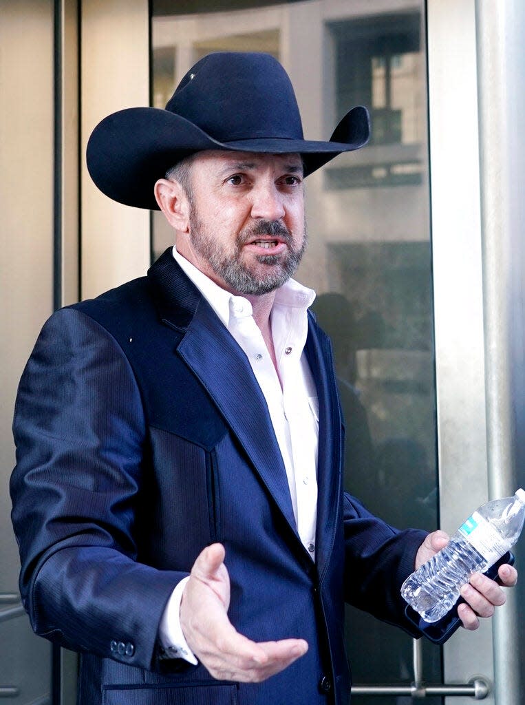 Otero County Commissioner Couy Griffin arrives at the Federal Court House in Washington, Monday, March 21, 2022. Griffin is charged with illegally entering Capitol grounds the day a pro-Trump mob disrupted certification of Joe Biden's presidential election victory on Jan. 6, 2021.