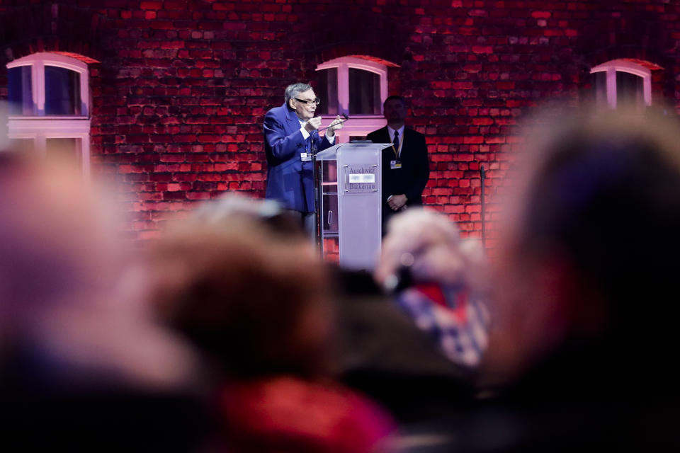 In this Monday, Jan. 27, 2020 photo, Auschwitz survivor Marian Turski delivers a speech during commemorations marking the 75th anniversary of the liberation of the the Auschwitz death camp in Oswiecim, Poland. Turski made a powerful warning against indifference in the face of discrimination. His remarks are reverberating strongly in his native Poland, with some praising it as a wise and historic speech, but the conservative government criticizing it as overtly political. (AP Photo/Markus Schreiber)