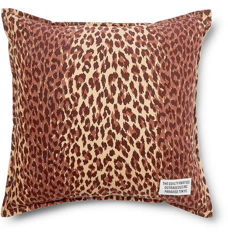 34) Leopard print cushion