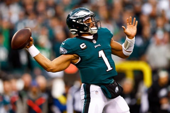 Jalen Hurts #1 of the Philadelphia Eagles throws a pass during the first quarter of the NFC Championship NFL football game against the <a class="link " href="https://sports.yahoo.com/nfl/teams/san-francisco/" data-i13n="sec:content-canvas;subsec:anchor_text;elm:context_link" data-ylk="slk:San Francisco 49ers;sec:content-canvas;subsec:anchor_text;elm:context_link;itc:0">San Francisco 49ers</a> at Lincoln Financial Field on January 29, 2023 in Philadelphia, Pennsylvania. <span class="copyright">Kevin Sabitus—Getty Images</span>