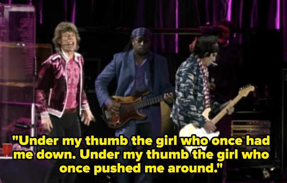 Mick Jagger singing lyrics "Under my thumb the girl who once had me down. Under my thumb the girl who once pushed me around"