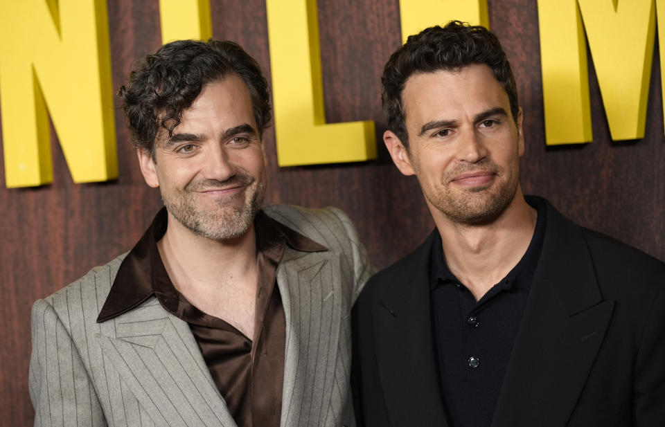 Daniel Ings, left, and Theo James, cast members in "The Gentlemen," pose together at a photo call for the Netflix film, Wednesday, Feb. 28, 2024, at the Tudum Theatre in Los Angeles. (AP Photo/Chris Pizzello)