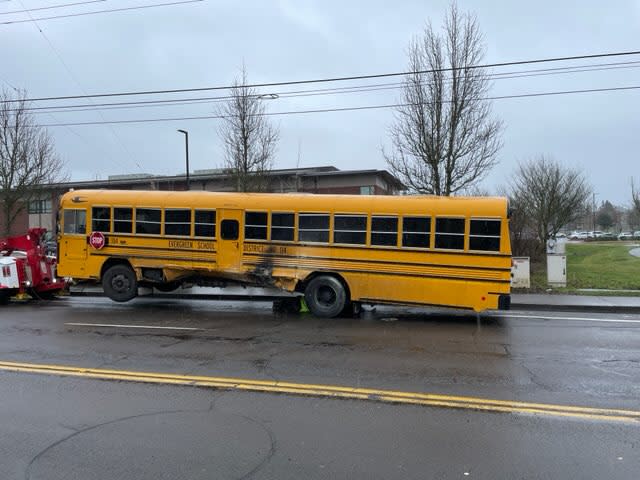 A crash involving an SUV and a school bus on Wednesday, Jan. 24, 2024. (Credit: Vancouver PD)