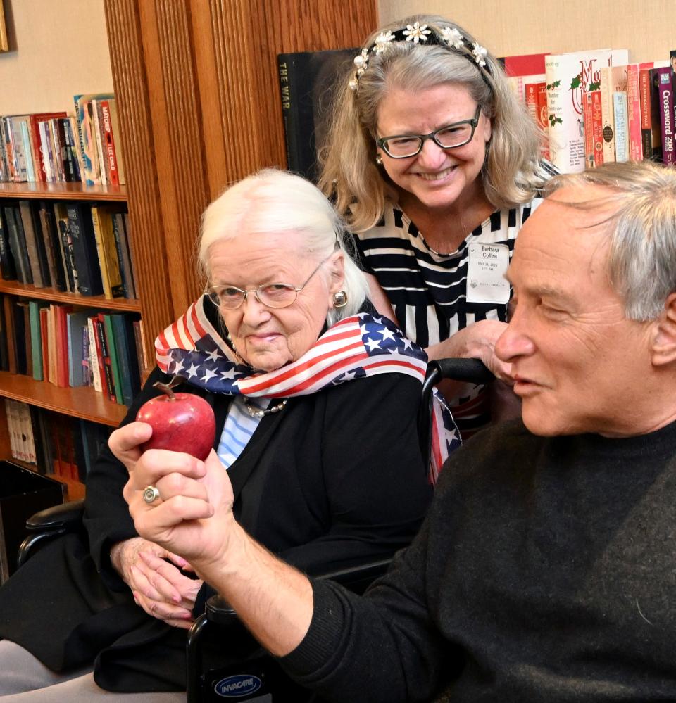 One-time Wave and teacher Alice Melaven, 101, visits with Steve Kramer of Mashpee, one of her students from 60 years ago, and her niece Barbara Collins of North Falmouth, at the Royal Megansett Nursing & Retirement Home in North Falmouth.