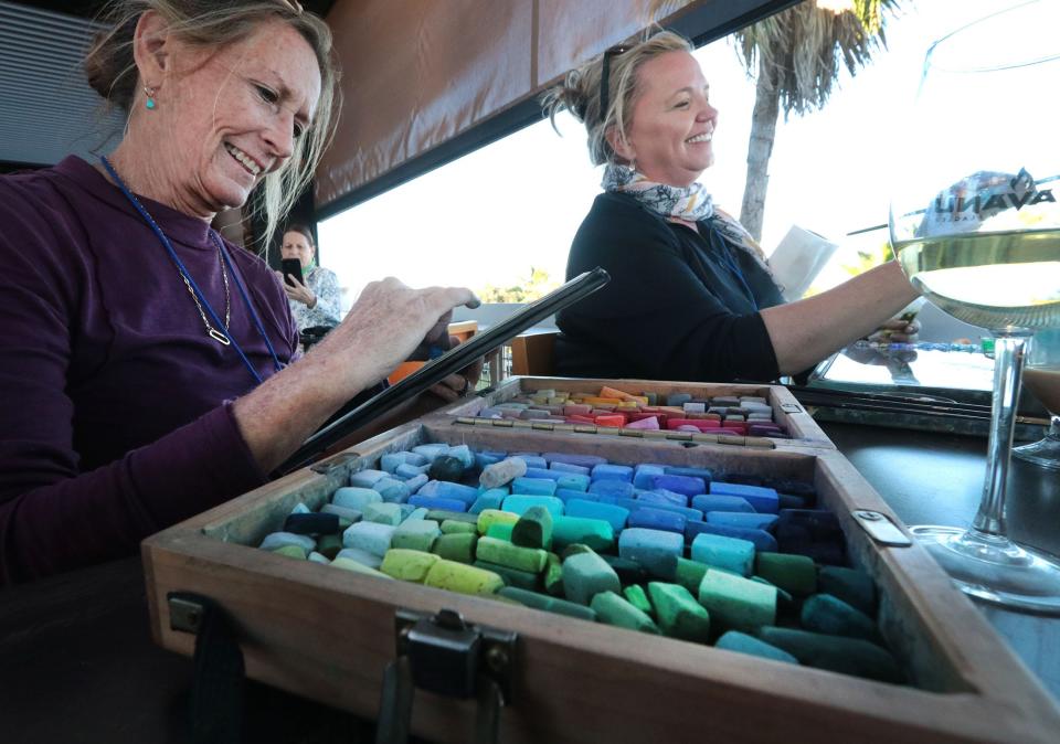 Artists Barbara Ortiz and Michelle Held, Tuesday, Oct. 17, 2023, during the New Smyrna Beach Plein Air Paint Out at the Avanu on Flagler restaurant.