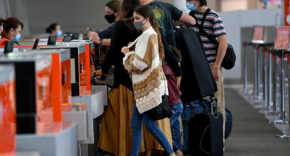 A photo of Jetstar customers at an Australian airport. 