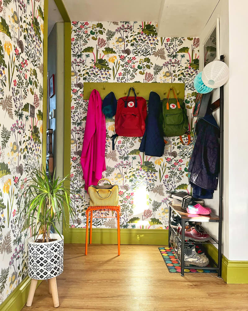 Colorful floral wallpaper in entry of newly renovated home.