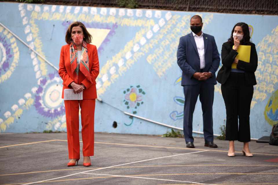 SAN FRANCISCO, CALIFORNIA - SEPTEMBER 02: U.S. Speaker of the House Nancy Pelosi (L) (D-CA) looks on during a Day of Action For the Children event at Mission Education Center Elementary School on September 02, 2020 in San Francisco, California. Nancy Pelosi is drawing criticism for patronizing a hair salon to get her hair done despite the salon being closed to in-person visits due to COVID-19 restrictions. (Photo by Justin Sullivan/Getty Images)