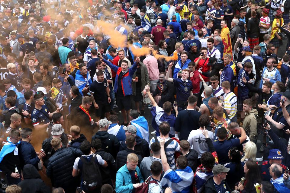 Some fans lit flares as the pre match party descended upon Leicester Square. (PA)