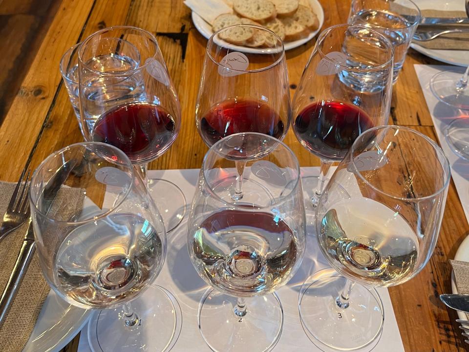 wine glasses on a table for a tasting at wine bar George in disney springs