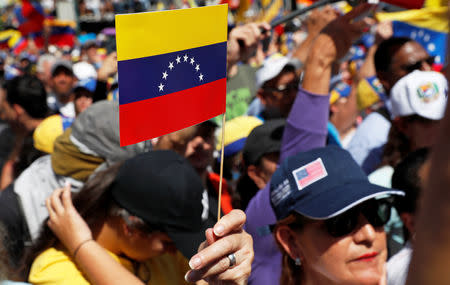 Opposition supporters take part in a rally against Venezuelan President Nicolas Maduro's government in Caracas, Venezuela February 2, 2019. REUTERS/Carlos Garcia Rawlins