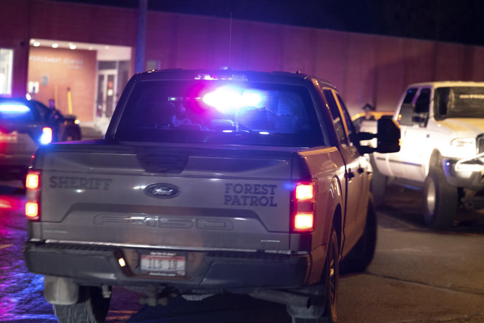 The truck with with paper blocking some of its windows and believed to be transporting Bryan Kohberger, who is accused of killing four University of Idaho students in November 2022, arrives in a police motorcade at the Latah County Courthouse, Wednesday, Jan. 4, 2023, in Moscow, Idaho, following Kohberger's extradition from Pennsylvania. (AP Photo/Ted S. Warren)