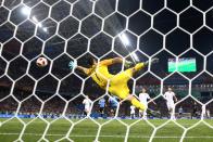 <p>Edinson Cavani (out of frame) scores his second goal past Portugal’s Rui Patricio to give Uruguay a 2-1 lead in their Round of 16 World Cup clash </p>