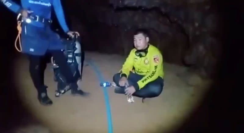 Rescue workers are seen at Phra Sai Ngam cave during an operation to save a trapped Thai monk