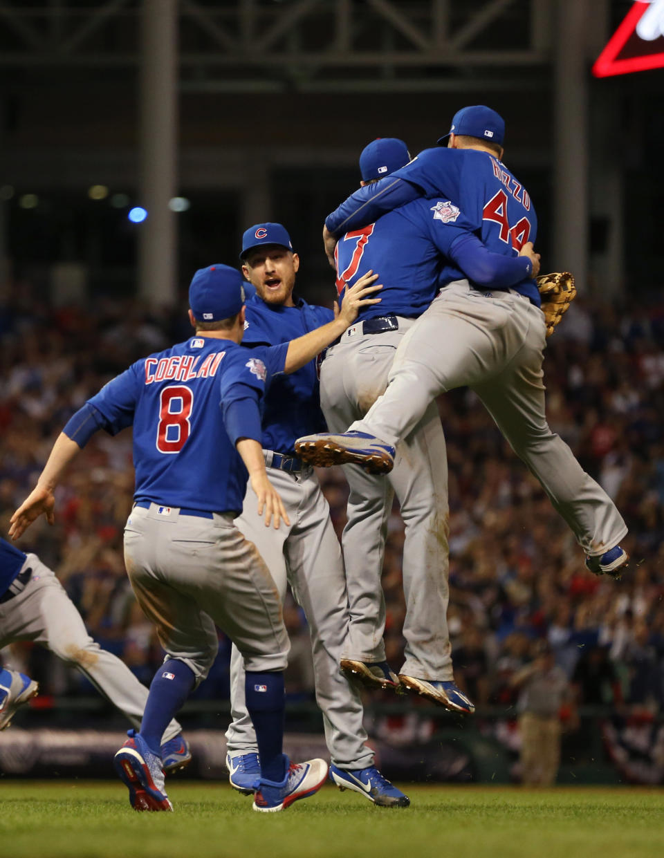 CLEVELAND, OH - NOVEMBER 2:  Chris Coghlan #8, Kris Bryant #17 and Anthony Rizzo # 44 of the Chicago Cubs celebrate after winning Game 7 of the 2016 World Series against the Cleveland Indians at Progressive Field on Wednesday, November 2, 2016 in Cleveland, Ohio. (Photo by Brad Mangin/MLB Photos via Getty Images) 