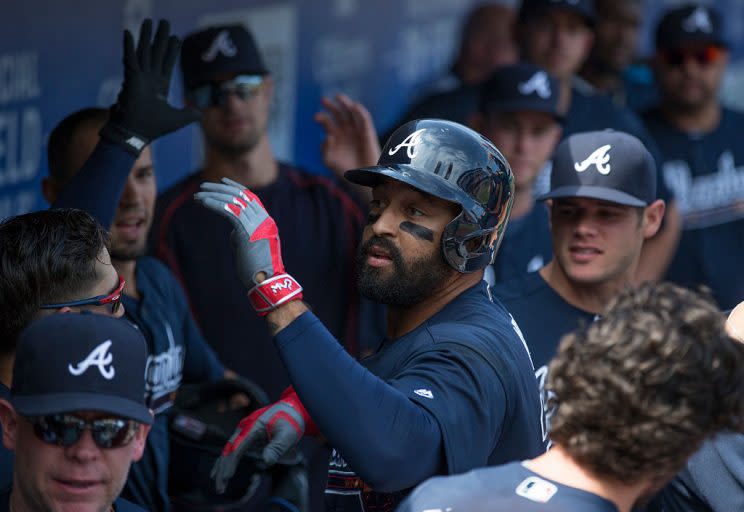 PHILADELPHIA, PA - SEPTEMBER 04: Matt Kemp #27 of the Atlanta Braves high fives his teammates after hitting a solo home run in the top of the second inning against the Philadelphia Phillies at Citizens Bank Park on September 4, 2016 in Philadelphia, Pennsylvania. (Photo by Mitchell Leff/Getty Images)