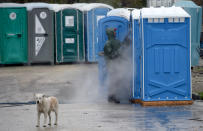 <p>A toilet cabin in an industrial area of Pilisvorosvar, Hungary. (Photo: Attila Kisbenedek/AFP/Getty Images) </p>