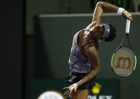 Mar 29, 2017; Miami, FL, USA; Venus Williams of the United States serves against Angelique Kerber of Germany (not pictured) on day nine of the 2017 Miami Open at Crandon Park Tennis Center. Williams won 7-5, 6-3. Mandatory Credit: Geoff Burke-USA TODAY Sports