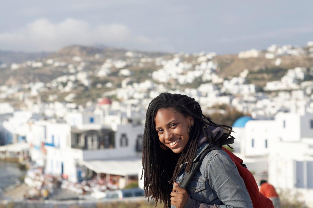 woman smiling in Santorini, Greece