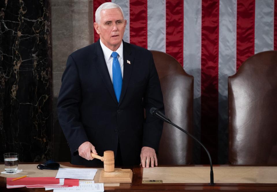 Mike Pence, who found himself at the centre of events during the riot, has pushed back at his former boss’s claim that he had the power to overturn the election result (POOL/AFP via Getty Images)