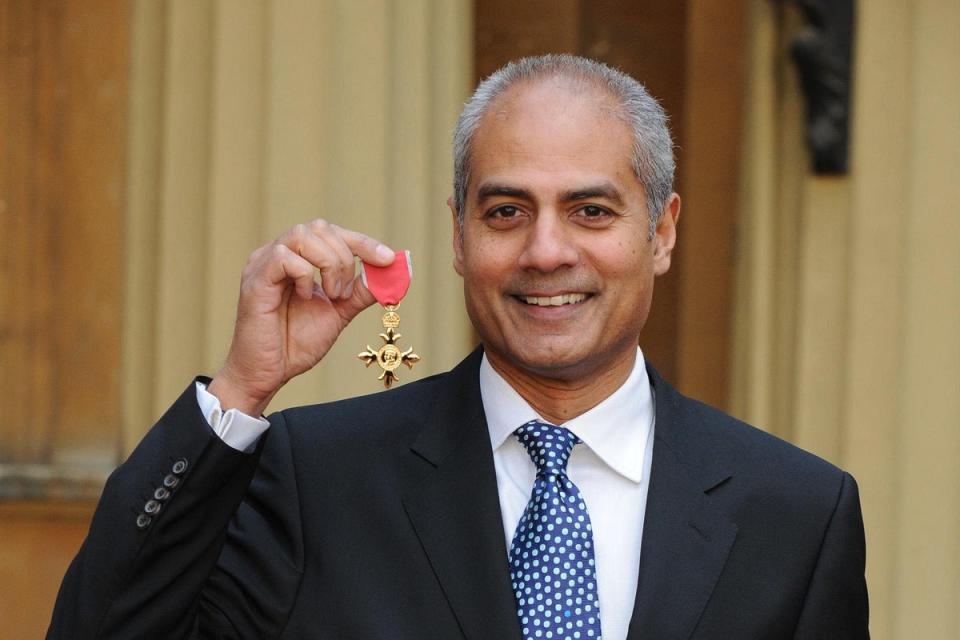Posing with his OBE in 2008 (PA Archive)