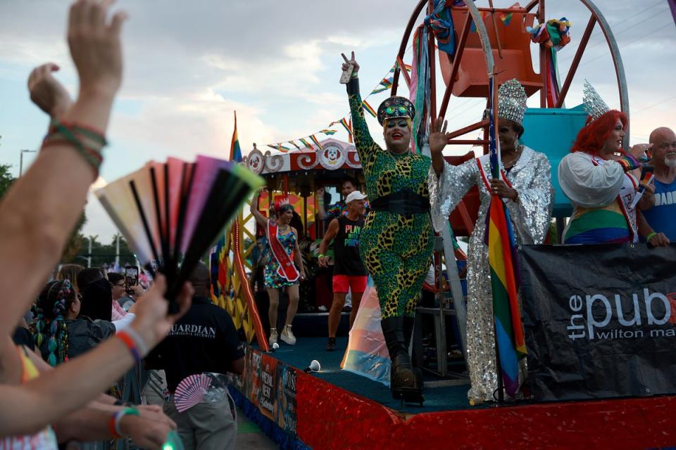 Drag queens ride on a float during the Stonewall Pride parade on June 17, 2023 in Wilton Manors, Florida (Getty Images)