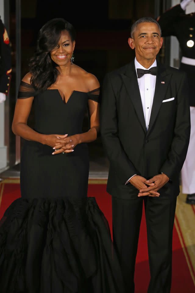 All eyes were on Michelle Obama when she arrived at the China State Dinner held Friday at the White House in Washington, D.C. The First Lady looked effortlessly posh, donning an off-the-shoulder black silk crepe mermaid gown by designer Vera Wang, as she welcomed China's president, Xi Jinping, as the evening's guest of honor. <strong> WATCH: Pope Francis' First Visit to U.S. Has Celebrities Freaking Out</strong> The beautiful custom gown features an architectural V-neckline and tulle sleeves, accented by a hand-draped silk textural organza pleated skirt. Getty Images Obama took to social media to share a photo from inside the dinner party, and, of course, that dress. "First glance at tonight's China State Dinner," the 51-year-old tweeted. First glance at tonight's China State Dinner. pic.twitter.com/8JSkABvvdX— The First Lady (@FLOTUS) September 25, 2015 There were over 200 guests in attendance, including <em>Empire</em> co-creator Lee Daniels, political scientist Henry Kissinger, ballet dancer Misty Copeland, Apple CEO Tim Cook, Facebook creator Mark Zuckerberg and entertainment industry executives, including Disney CEO Bob Iger and DreamWorks Animation CEO Jeffrey Katzenberg. Before guests arrived, Obama teased a few other sneak peeks of the event. "Crossing the t's and dotting the i's for tonight's China State Dinner," she shared on Twitter. Crossing the t's and dotting the i's for tonight's China State Dinner. http://t.co/CZDygYZzdq pic.twitter.com/zdQG1pi8m0— The First Lady (@FLOTUS) September 25, 2015 <strong> PHOTOS: Michelle Obama: First Lady of Fashion</strong> "Farm to table happens right here at the @WhiteHouse! Tonight's State Dinner includes peppers from the Kitchen Garden," another tweet read. Farm to table happens right here at the @WhiteHouse! Tonight’s State Dinner includes peppers from the Kitchen Garden. pic.twitter.com/lV2sGWU8Q9— The First Lady (@FLOTUS) September 25, 2015 Ahead of the dinner, President Barack Obama and the first lady greeted Xi and his wife with a 21-gun salute on the South Lawn and a red carpet ceremony. Following photos, Barack and Michelle shared a sweet moment, which was captured on video. "May I just say, you look stunning," POTUS says to his wife. President Obama to @flotus: "May I just say, you look stunning." ������ #ChinaStateDinner pic.twitter.com/L90WZiY1rE— Kate Bennett (@KateBennett_DC) September 25, 2015 As if that weren't adorable enough, another cute moment between the two was captured as Michelle fixed the President's bow tie. Getty Images <strong> NEWS: Prince Harry Meets Michelle Obama For Tea</strong> The first lady's 54-year-old husband wasn't the only one stunned by his wife's flawless look. The Internet went crazy, gushing over her stylish getup over social media. "Michelle Obama is the best argument against term limits," director Ava DuVernay tweeted along with four pics of Obama from the event. Michelle Obama is the best argument against term limits. - @KaraRBrown pic.twitter.com/gcky3S0Zf5— Ava DuVernay (@AVAETC) September 26, 2015 "Michelle Obama in Vera Wang got Barack lookin like he just realized his date to prom is by far the hottest," comedian Lisa Vikingstad tweeted. Michelle Obama in Vera Wang got Barack lookin like he just realized his date to prom is by far the hottest. pic.twitter.com/Me8kLYthCb— Lisa Vikingstad (@LisaVikingstad) September 26, 2015 The dress' designer, Vera Wang, felt honored by the accolades. "It is such a privilege, as an American of Chinese heritage, to have dressed First Lady @MichelleObama for this state dinner honoring President Xi Jinping and First Lady Peng Liyuan, of the People's Rebublic of China," she tweeted. It is such a privilege, as an American of Chinese heritage, to have dressed First Lady @MichelleObama for this st… http://t.co/PwJiX3d17s— Vera Wang (@VeraWangGang) September 25, 2015 Watch the video below to hear the first lady discuss what she's going to miss about living the White House.