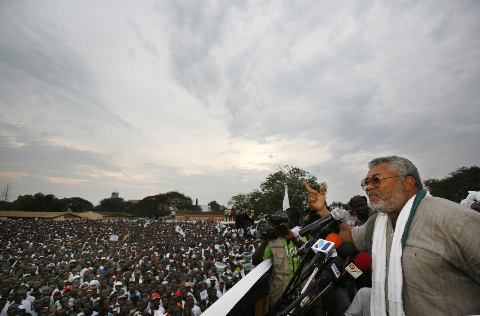 FILE - In this Friday, Dec. 5, 2008 file photo, former Ghanaian President Jerry Rawlings speaks at the final campaign rally for opposition presidential candidate John Atta Mills, in Tema, Ghana. Ghana's former president Jerry Rawlings, who staged two coups and later led the West African country's transition to a stable democracy, has died aged 73, according to the state's Radio Ghana and the president Thursday, Nov. 12, 2020. (AP Photo/Rebecca Blackwell, File)