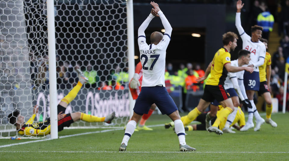 Watford's Ignacio Pussetto, left, saves on the net line during the English Premier League soccer match between Watford and Tottenham Hotspur at Vicarage Road, Watford, England, Saturday, Jan. 18, 2020. (AP Photo/Frank Augstein)