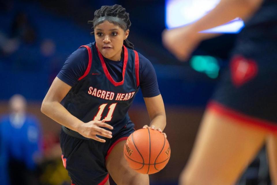 ZaKiyah Johnson is hoping to lead Sacred Heart Academy to its fourth consecutive high school basketball state championship. Johnson is one of the top recruiting prospects in the nation.