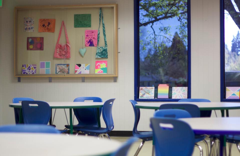 New furniture and a new art display case can be found in the arts room, which currently shows off two purses made by students during their sewing program.